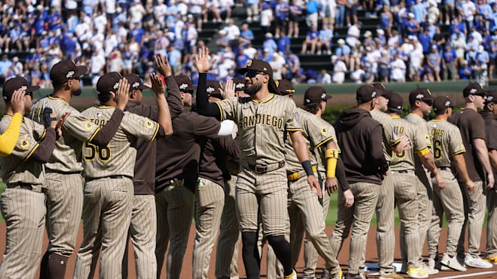 Sep 30, 2025; Chicago, Illinois, USA; San Diego Padres outfielder Fernando Tatis Jr. (23) is introduced during game one of the Wildcard round for the 2025 MLB playoffs at Wrigley Field. Mandatory Credit: David Banks-Imagn Images