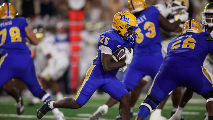 Nov 22, 2025; Atlanta, Georgia, USA; Pittsburgh Panthers running back Ja'Kyrian Turner (25) runs the ball against the Georgia Tech Yellow Jackets in the second quarter at Bobby Dodd Stadium at Hyundai Field. Mandatory Credit: Brett Davis-Imagn Images
