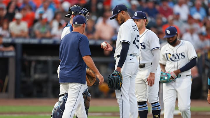 Tampa Bay manager Kevin Cash (16) takes Taj Bradley (45) out of the game against the Baltimore Orioles in the second inning. Tampa Bay manager Kevin Cash (16) takes Taj Bradley (45) out of the game against the Baltimore Orioles in the second inning.