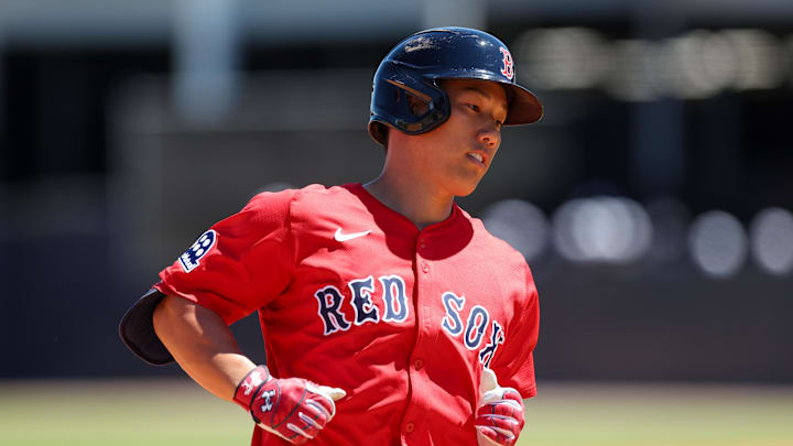 Mar 18, 2025; Tampa, Florida, USA; Boston Red Sox outfielder Masataka Yoshida (7) runs the bases after hitting a two run home run against the New York Yankees in the sixth inning during spring training at George M. Steinbrenner Field. Mandatory Credit: Nathan Ray Seebeck-Imagn Images