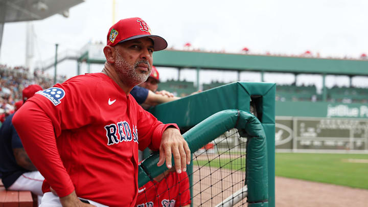 Feb 22, 2026; Fort Myers, Florida, USA;  Boston Red Sox manager Alex Cora (13) looks on during the first inning against the Toronto Blue Jays at JetBlue Park at Fenway South. Mandatory Credit: Kim Klement Neitzel-Imagn Images