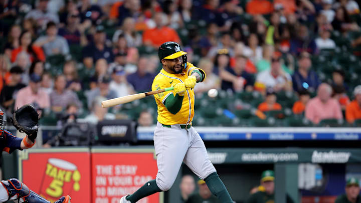 Jul 27, 2025; Houston, Texas, USA; Athletics third baseman Miguel Andujar (22) hits a home run to right field against the Houston Astros during the first inning at Daikin Park. Mandatory Credit: Erik Williams-Imagn Images Jul 27, 2025; Houston, Texas, USA; Athletics third baseman Miguel Andujar (22) hits a home run to right field against the Houston Astros during the first inning at Daikin Park. Mandatory Credit: Erik Williams-Imagn Images