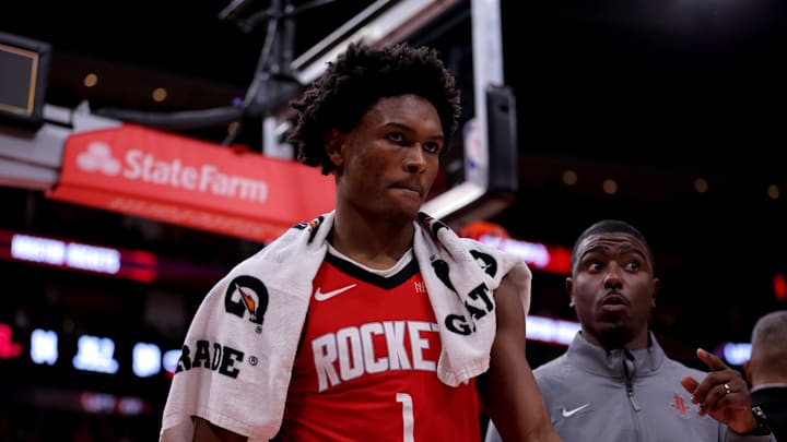 Dec 29, 2024; Houston, Texas, USA; Houston Rockets guard Amen Thompson (1) is escorted off the court after being ejected against the Miami Heat during the fourth quarter at Toyota Center. Mandatory Credit: Erik Williams-Imagn Images
