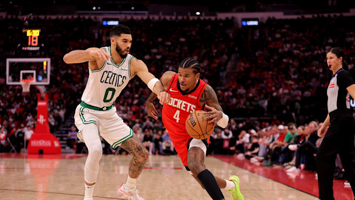 Jan 3, 2025; Houston, Texas, USA; Houston Rockets guard Jalen Green (4) controls the ball against Boston Celtics forward Jayson Tatum (0) during the second quarter at Toyota Center. Mandatory Credit: Erik Williams-Imagn Images Jan 3, 2025; Houston, Texas, USA; Houston Rockets guard Jalen Green (4) controls the ball against Boston Celtics forward Jayson Tatum (0) during the second quarter at Toyota Center. Mandatory Credit: Erik Williams-Imagn Images