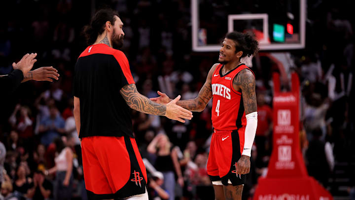 Mar 15, 2025; Houston, Texas, USA; Houston Rockets guard Jalen Green (4) is congratulated by Houston Rockets center Steven Adams (12) after a made basket against the Chicago Bulls during the fourth quarter at Toyota Center. Mandatory Credit: Erik Williams-Imagn Images
