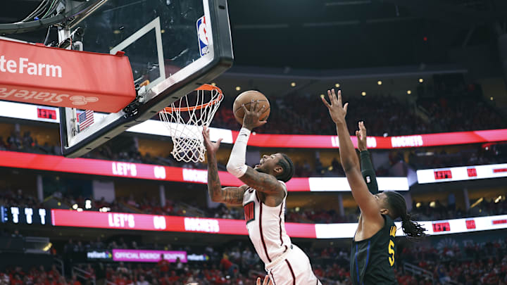 May 4, 2025; Houston, Texas, USA; Golden State Warriors forward Kevon Looney (5) defends as Houston Rockets guard Jalen Green (4) attempts to score during game seven of the first round for the 2025 NBA Playoffs at Toyota Center. Mandatory Credit: Troy Taormina-Imagn Images May 4, 2025; Houston, Texas, USA; Golden State Warriors forward Kevon Looney (5) defends as Houston Rockets guard Jalen Green (4) attempts to score during game seven of the first round for the 2025 NBA Playoffs at Toyota Center. Mandatory Credit: Troy Taormina-Imagn Images