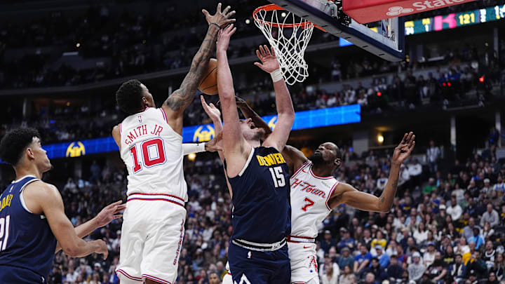 Dec 15, 2025; Denver, Colorado, USA; Houston Rockets forward Jabari Smith Jr. (10) and forward Kevin Durant (7) defend on Denver Nuggets center Nikola Jokic (15) in overtime at Ball Arena. Mandatory Credit: Ron Chenoy-Imagn Images Dec 15, 2025; Denver, Colorado, USA; Houston Rockets forward Jabari Smith Jr. (10) and forward Kevin Durant (7) defend on Denver Nuggets center Nikola Jokic (15) in overtime at Ball Arena. Mandatory Credit: Ron Chenoy-Imagn Images