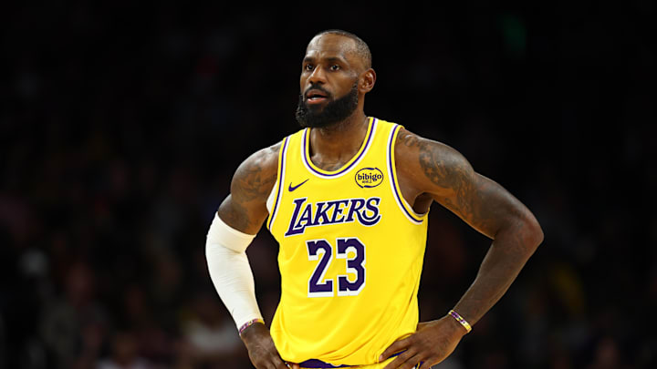 Dec 23, 2025; Phoenix, Arizona, USA; Los Angeles Lakers forward LeBron James (23) against the Phoenix Suns at Mortgage Matchup Center. Mandatory Credit: Mark J. Rebilas-Imagn Images