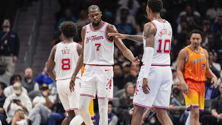 Feb 19, 2026; Charlotte, North Carolina, USA; Houston Rockets forward Kevin Durant (7)reacts with forward Jabari Smith Jr. (10) after a foul call during the second  quarter against the Charlotte Hornets at Spectrum Center. Mandatory Credit: Jim Dedmon-Imagn Images