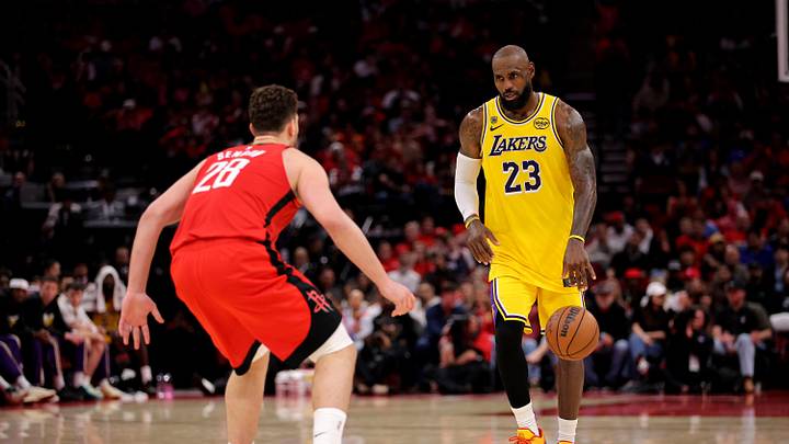May 1, 2026; Houston, Texas, USA; Los Angeles Lakers forward Lebron James (23) handles the ball against Houston Rockets center Alperen Sengun (28) during the fourth quarter of game six of the first round of the 2026 NBA Playoffs at Toyota Center. Mandatory Credit: Erik Williams-Imagn Images