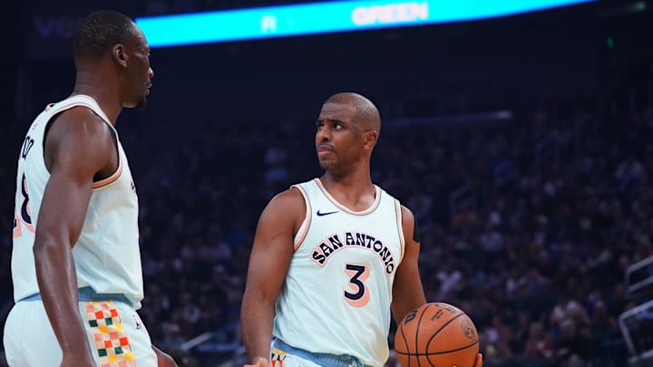 Apr 9, 2025; San Francisco, California, USA; San Antonio Spurs guard Chris Paul (3) talks with San Antonio Spurs center Bismack Biyombo (18) after a Golden State Warriors basket in the first period at Chase Center. Mandatory Credit: David Gonzales-Imagn Images Apr 9, 2025; San Francisco, California, USA; San Antonio Spurs guard Chris Paul (3) talks with San Antonio Spurs center Bismack Biyombo (18) after a Golden State Warriors basket in the first period at Chase Center. Mandatory Credit: David Gonzales-Imagn Images