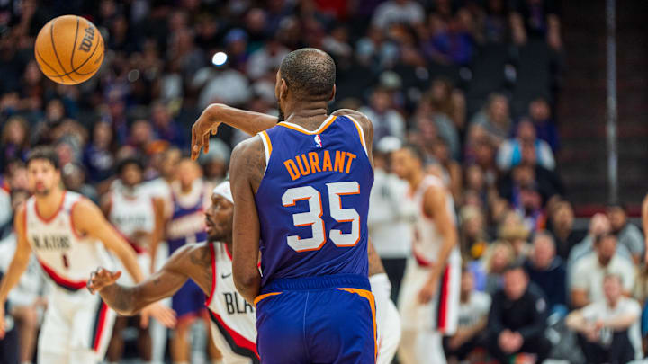 Nov 2, 2024; Phoenix, Arizona, USA;  Phoenix Suns forward Kevin Durant (35) passes the ball down court during the second half during a game against the Portland Trail Blazers at Footprint Center. Mandatory Credit: Allan Henry-Imagn Images