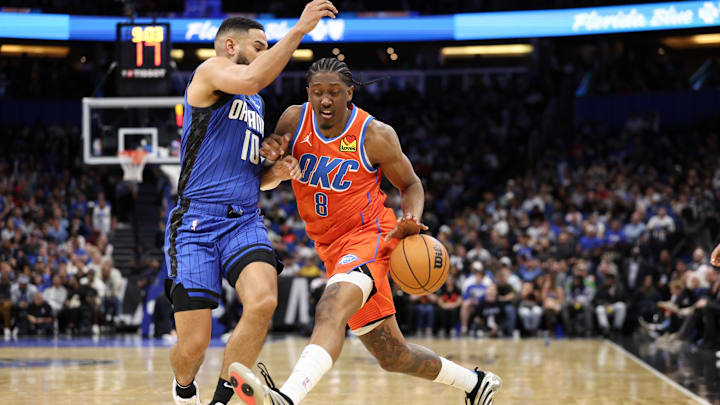 Dec 19, 2024; Orlando, Florida, USA; Oklahoma City Thunder forward Jalen Williams (8) is guarded by Orlando Magic guard Cory Joseph (10) in the fourth quarter at Kia Center. Mandatory Credit: Nathan Ray Seebeck-Imagn Images