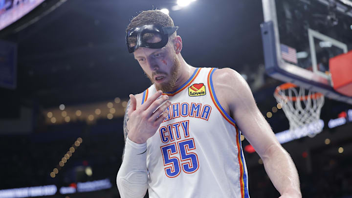 Mar 27, 2025; Oklahoma City, Oklahoma, USA; Oklahoma City Thunder center Isaiah Hartenstein (55) checks out an injury under his left eye after a play against the Memphis Grizzlies during the second half at Paycom Center. Mandatory Credit: Alonzo Adams-Imagn Images