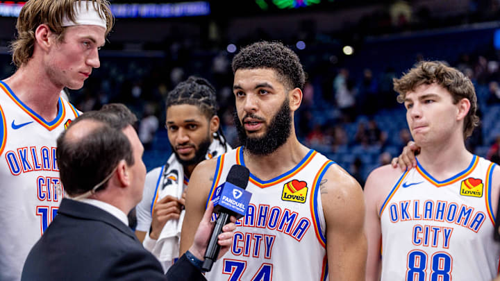 Apr 13, 2025; New Orleans, Louisiana, USA; Oklahoma City Thunder forward Kenrich Williams (34) and center Branden Carlson (15) and guard Alex Ducas (88) talk to reporter Nick Gallo after the game against the New Orleans Pelicans at Smoothie King Center. Mandatory Credit: Stephen Lew-Imagn Images Apr 13, 2025; New Orleans, Louisiana, USA; Oklahoma City Thunder forward Kenrich Williams (34) and center Branden Carlson (15) and guard Alex Ducas (88) talk to reporter Nick Gallo after the game against the New Orleans Pelicans at Smoothie King Center. Mandatory Credit: Stephen Lew-Imagn Images