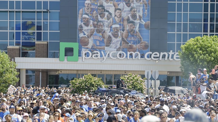 Jun 24, 2025; Oklahoma City, OK, USA; Oklahoma City Thunder fans gather outside the Paycom Center to watch the Oklahoma City Thunder Champions parade. Mandatory Credit: Alonzo Adams-Imagn Images