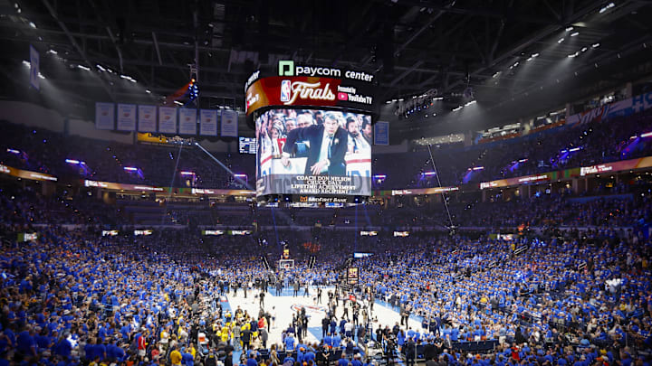 Jun 8, 2025; Oklahoma City, Oklahoma, USA; A view of the fans and the arena and the court as former NBA coach and general manager Don Nelson is honored during a timeout between the Oklahoma City Thunder and the Indiana Pacers in game two of the 2025 NBA Finals at Paycom Center. Mandatory Credit: Alonzo Adams-Imagn Images Jun 8, 2025; Oklahoma City, Oklahoma, USA; A view of the fans and the arena and the court as former NBA coach and general manager Don Nelson is honored during a timeout between the Oklahoma City Thunder and the Indiana Pacers in game two of the 2025 NBA Finals at Paycom Center. Mandatory Credit: Alonzo Adams-Imagn Images