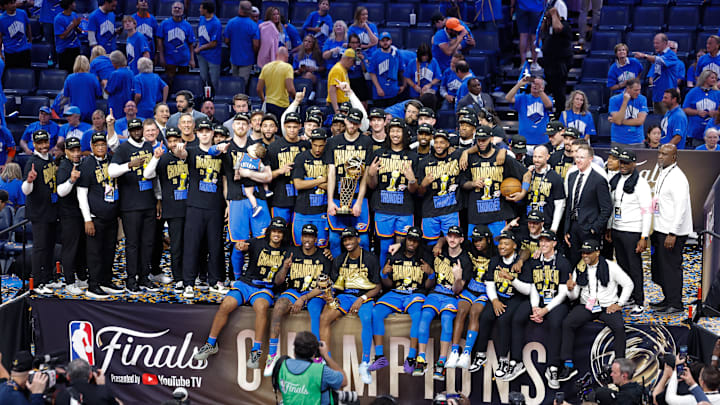 Jun 22, 2025; Oklahoma City, Oklahoma, USA; The Oklahoma City Thunder pose for a team photo with the Larry O'Brien Championship Trophy as they celebrate after winning game seven of the 2025 NBA Finals against the Indiana Pacers at Paycom Center. Mandatory Credit: Alonzo Adams-Imagn Images