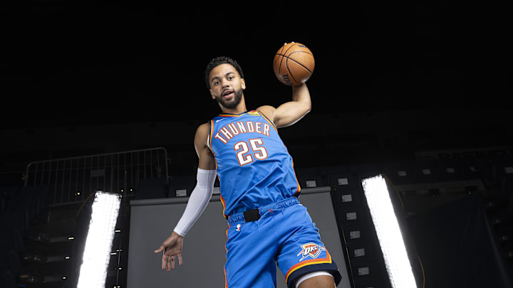Sep 29, 2025; Oklahoma City, OK, USA; Oklahoma City Thunder guard Ajay Mitchell (25) poses for a photo during the 2025 Oklahoma City Thunder media day at Paycom Center. Mandatory Credit: Alonzo Adams-Imagn Images