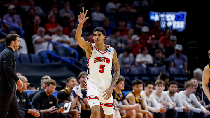 Mar 19, 2026; Oklahoma City, OK, USA; Houston Cougars center Chris Cenac Jr. (5) signals to his team during a first round game of the men's 2026 NCAA Tournament at Paycom Center.