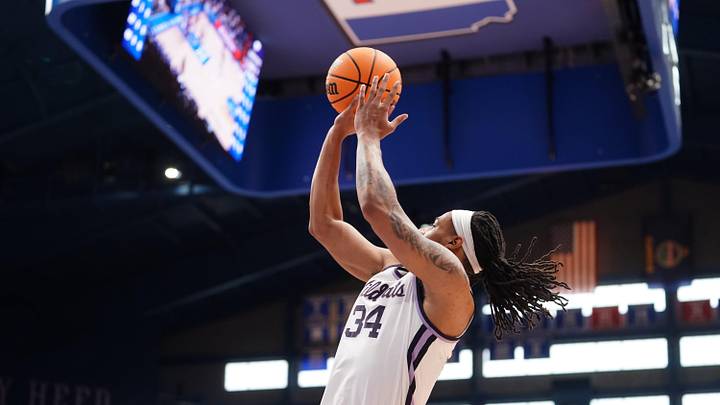 Kansas State Wildcats guard Nate Johnson (34) lines up a shot against Kansas Jayhawks during the Sunflower Showdown game inside Allen Fieldhouse in Lawrence, Kansas, on Saturday, March 7, 2026. Kansas State Wildcats guard Nate Johnson (34) lines up a shot against Kansas Jayhawks during the Sunflower Showdown game inside Allen Fieldhouse in Lawrence, Kansas, on Saturday, March 7, 2026.