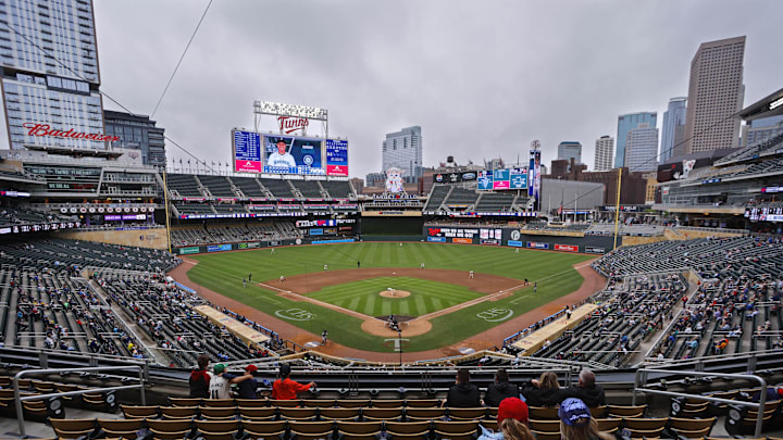Jun 26, 2025; Minneapolis, Minnesota, USA; Sparsely seated fans watch the Seattle Mariners play the Minnesota Twins in the seventh inning after a nearly four and a half hour rain delay at Target Field. Mandatory Credit: Bruce Kluckhohn-Imagn Images Jun 26, 2025; Minneapolis, Minnesota, USA; Sparsely seated fans watch the Seattle Mariners play the Minnesota Twins in the seventh inning after a nearly four and a half hour rain delay at Target Field. Mandatory Credit: Bruce Kluckhohn-Imagn Images