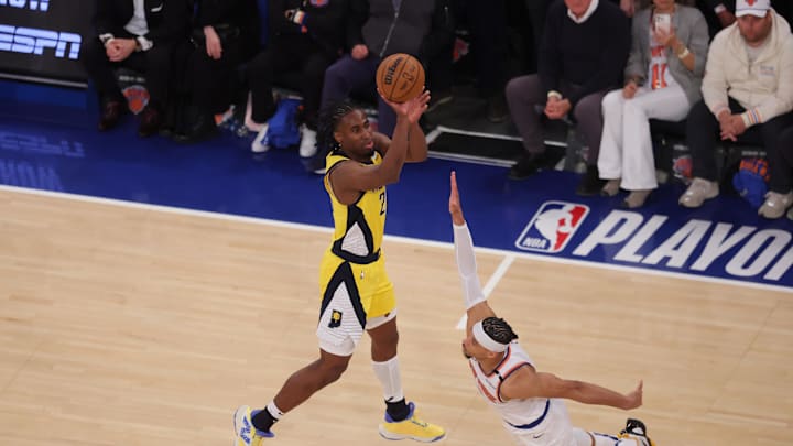 May 21, 2025; New York, New York, USA; Indiana Pacers forward Aaron Nesmith (23) shoots a three point shot against New York Knicks guard Josh Hart (3) in the fourth quarter during game one of the eastern conference finals for the 2025 NBA Playoffs at Madison Square Garden. Mandatory Credit: Brad Penner-Imagn Images