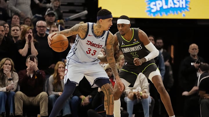 Feb 1, 2025; Minneapolis, Minnesota, USA; Washington Wizards forward Kyle Kuzma (33) works against Minnesota Timberwolves forward Jaden McDaniels (3) in the fourth quarter at Target Center. Mandatory Credit: Bruce Kluckhohn-Imagn Images Feb 1, 2025; Minneapolis, Minnesota, USA; Washington Wizards forward Kyle Kuzma (33) works against Minnesota Timberwolves forward Jaden McDaniels (3) in the fourth quarter at Target Center. Mandatory Credit: Bruce Kluckhohn-Imagn Images