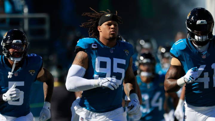 Jacksonville Jaguars defensive end Roy Robertson-Harris (95) runs onto the field before a regular season NFL football matchup Sunday, Dec. 31, 2023 at EverBank Stadium in Jacksonville, Fla. The Jacksonville Jaguars blanked the Carolina Panthers 26-0. [Corey Perrine/Florida Times-Union]