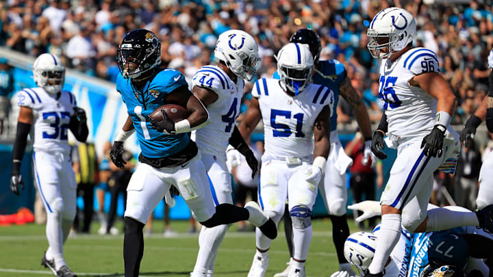 Jacksonville Jaguars running back Travis Etienne Jr. (1) scores a touchdown during the second quarter of an NFL football matchup Sunday, Oct. 15, 2023 at EverBank Stadium in Jacksonville, Fla. The Jacksonville Jaguars defeated the Indianapolis Colts 37-20. [Corey Perrine/Florida Times-Union]