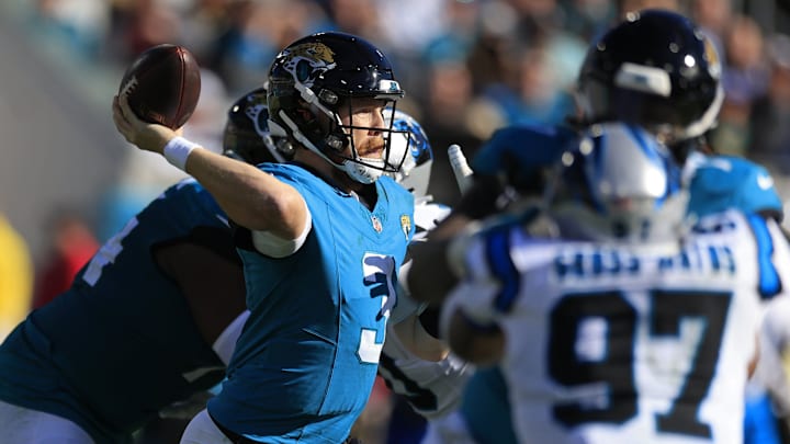 Jacksonville Jaguars quarterback C.J. Beathard (3) looks to pass during the second quarter of a regular season NFL football matchup Sunday, Dec. 31, 2023 at EverBank Stadium in Jacksonville, Fla. The Jacksonville Jaguars blanked the Carolina Panthers 26-0. [Corey Perrine/Florida Times-Union]