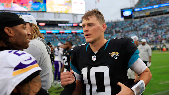 Jacksonville Jaguars quarterback Mac Jones (10) greets Minnesota Vikings cornerback Stephon Gilmore (2) after the game an NFL football matchup Sunday, Nov. 10, 2024 at Everbank Stadium in Jacksonville, Fla. The Vikings defeated the Jaguars 12-7. [Corey Perrine/Florida Times-Union]