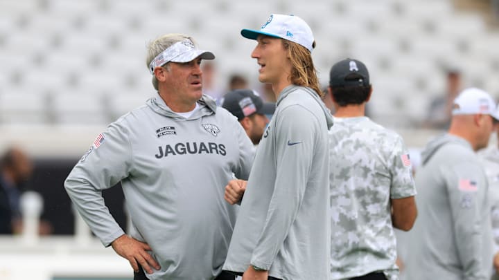 Jacksonville Jaguars quarterback Trevor Lawrence (16) talks to head coach Doug Pederson before an NFL football matchup Sunday, Nov. 10, 2024 at Everbank Stadium in Jacksonville, Fla. [Corey Perrine/Florida Times-Union]