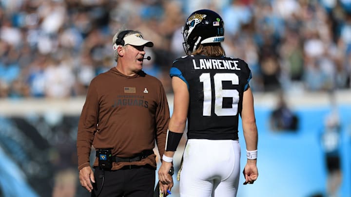 Jacksonville Jaguars head coach Doug Pederson talks with quarterback Trevor Lawrence (16) during the second quarter an NFL football matchup Sunday, Nov. 19, 2023 at EverBank Stadium in Jacksonville, Fla. The Jacksonville Jaguars defeated the Tennessee Titans 34-14. [Corey Perrine/Florida Times-Union]