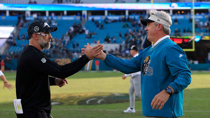 New York Jets interim head coach Jeff Ulbrich, left, and Jacksonville Jaguars head coach Doug Pederson shake hands after the game Sunday, Dec. 15, 2024 at EverBank Stadium in Jacksonville, Fla. The Jets held off the Jaguars 32-25. [Corey Perrine/Florida Times-Union]
