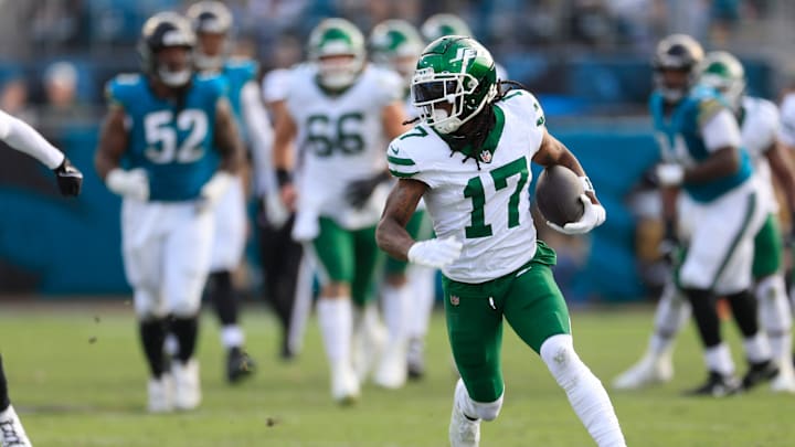 New York Jets wide receiver Davante Adams (17) rushes for yards during the third quarter Sunday, Dec. 15, 2024 at EverBank Stadium in Jacksonville, Fla. The Jets held off the Jaguars 32-25. [Corey Perrine/Florida Times-Union]