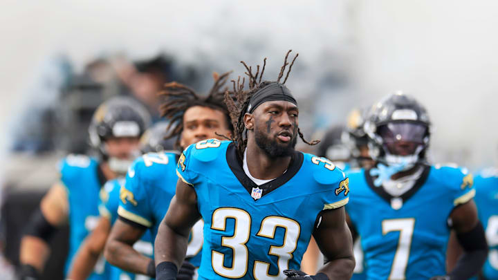 Jacksonville Jaguars linebacker Devin Lloyd (33) runs on the field before an NFL football matchup Sunday, Dec. 15, 2024 at EverBank Stadium in Jacksonville, Fla. [Corey Perrine/Florida Times-Union]