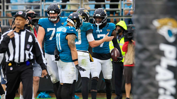 Jacksonville Jaguars wide receiver Brian Thomas Jr. (7) celebrates his touchdown score with quarterback Mac Jones (10) during the fourth quarter Sunday, Dec. 29, 2024 at EverBank Stadium in Jacksonville, Fla. The Jaguars held off the Titans 20-13. [Corey Perrine/Florida Times-Union]