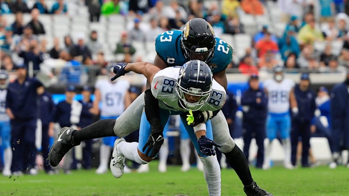 Jacksonville Jaguars linebacker Foyesade Oluokun (23) breaks up a pass intended for Tennessee Titans wide receiver Tyler Boyd (83) during the fourth quarter Sunday, Dec. 29, 2024 at EverBank Stadium in Jacksonville, Fla. The Jaguars held off the Titans 20-13. [Corey Perrine/Florida Times-Union]