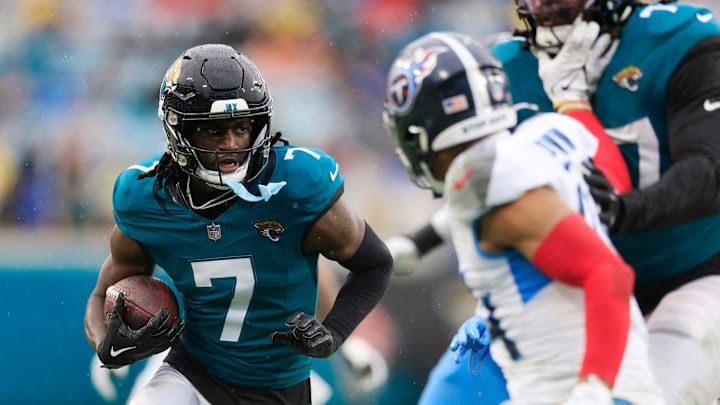 Jacksonville Jaguars wide receiver Brian Thomas Jr. (7) rushes for yards during the second quarter of an NFL football matchup Sunday, Dec. 29, 2024 at EverBank Stadium in Jacksonville, Fla. [Corey Perrine/Florida Times-Union]