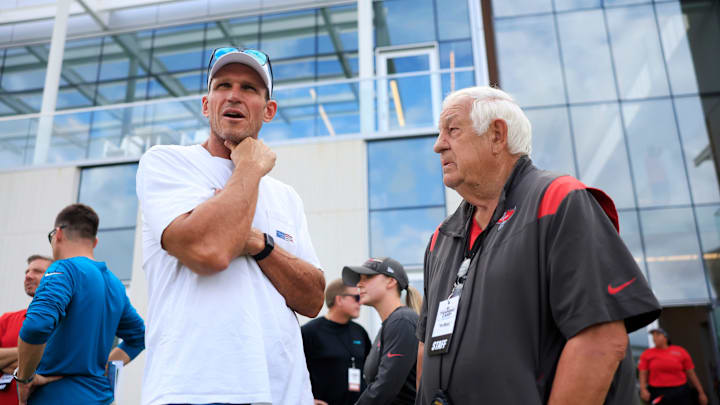 Tony Boselli, left, former Jacksonville Jaguars offensive tackle and hall of famer, talks with Tom Moore, Tampa Bay Buccaneers senior offensive assistant, during a combined NFL football training camp session between the Tampa Bay Buccaneers and Jacksonville Jaguars Thursday, Aug. 15, 2024 at EverBank Stadium’s Miller Electric Center in Jacksonville, Fla. [Corey Perrine/Florida Times-Union]