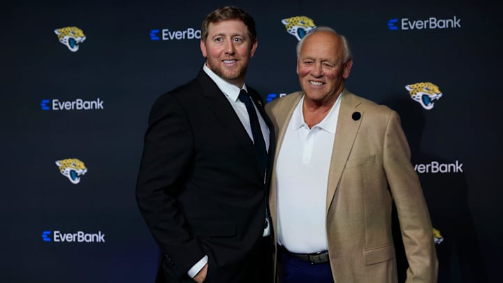New Jacksonville Jaguars head coach Liam Coen, left, poses with father, Tim Coen, after speaking and being introduced during a press conference Monday, Jan. 27, 2025 at the Miller Electric Center in Jacksonville, Fla. [Corey Perrine/Florida Times-Union]