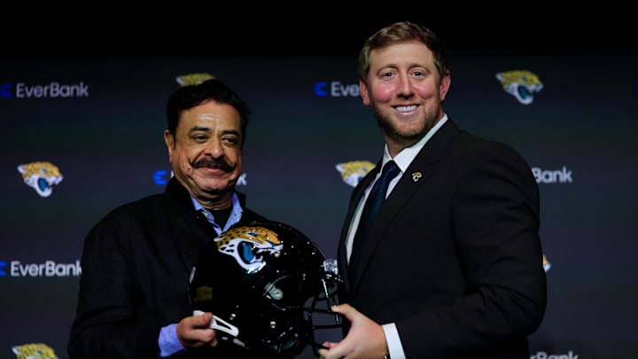 Jacksonville Jaguars owner Shad Khan, left, and new Jaguars head coach Liam Coen pose for a photo after speaking and being introduced during a press conference Monday, Jan. 27, 2025 at the Miller Electric Center in Jacksonville, Fla. [Corey Perrine/Florida Times-Union]