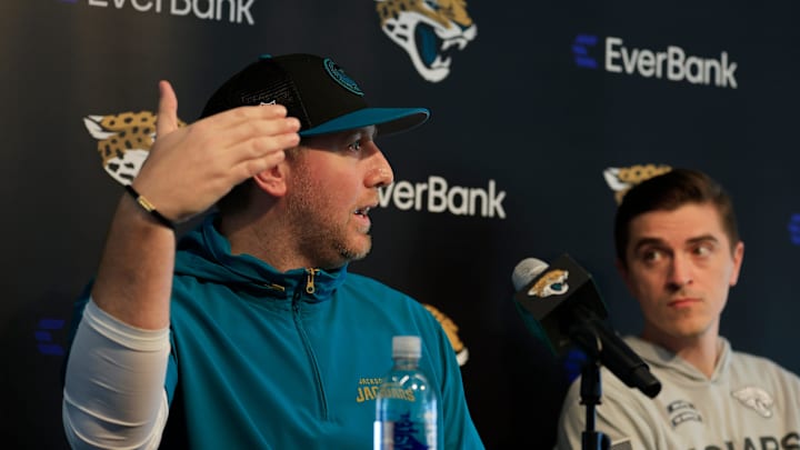 Jacksonville Jaguars head coach Liam Coen, left, speaks during a press conference next to general manager James Gladstone at Miller Electric Center Tuesday, April 15, 2025 in Jacksonville, Fla. [Corey Perrine/Florida Times-Union]