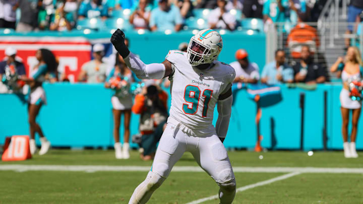 Sep 8, 2024; Miami Gardens, Florida, USA; Miami Dolphins linebacker Emmanuel Ogbah (91) celebrates after sacking Jacksonville Jaguars quarterback Trevor Lawrence (not pictured) during the fourth quarter at Hard Rock Stadium. Mandatory Credit: Sam Navarro-Imagn Images