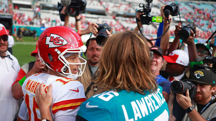 Kansas City Chiefs quarterback Patrick Mahomes (15) says goodbye to Jacksonville Jaguars quarterback Trevor Lawrence (16) after a NFL football game Sunday, Sept. 17, 2023 at EverBank Stadium in Jacksonville, Fla. The Kansas City Chiefs defeated the Jacksonville Jaguars 17-9. [Corey Perrine/Florida Times-Union]