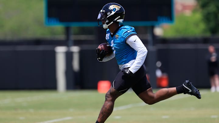 Jacksonville Jaguars running back Travis Etienne Jr. (1) runs the ball during the first organized team activity at Miller Electric Center Monday, May 19, 2025 in Jacksonville, Fla. Jacksonville Jaguars running back Travis Etienne Jr. (1) runs the ball during the first organized team activity at Miller Electric Center Monday, May 19, 2025 in Jacksonville, Fla.