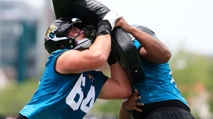 Jacksonville Jaguars guard Wyatt Milum (64) drills with guard Sal Wormley (61) during a rookie minicamp at Miller Electric Center Saturday, May 10, 2025 in Jacksonville, Fla.