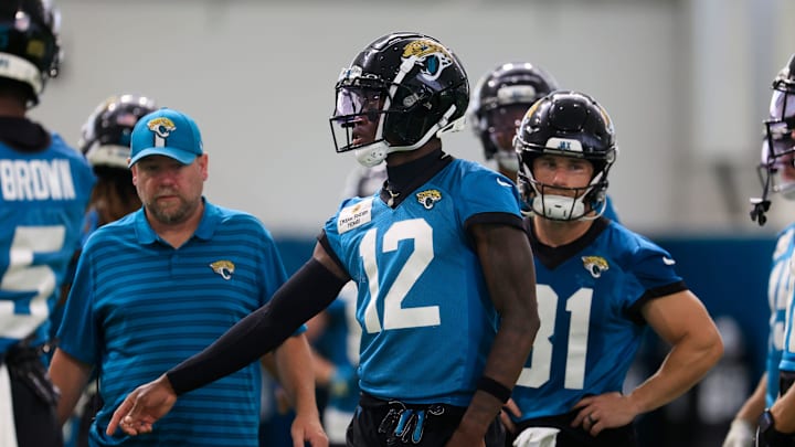 Jacksonville Jaguars wide receiver Travis Hunter (12) looks on during the 10th organized team activity at Miller Electric Center Wednesday, June 4, 2025 in Jacksonville, Fla. [Corey Perrine/Florida Times-Union]