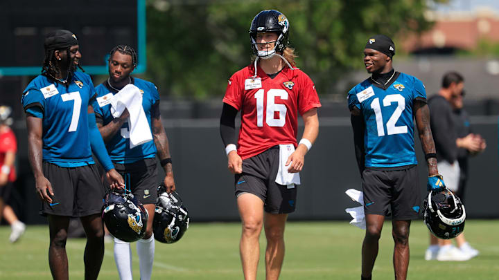 From left, Jacksonville Jaguars wide receiver Brian Thomas Jr. (7), wide receiver Dyami Brown (5), quarterback Trevor Lawrence (16) and wide receiver Travis Hunter (12) walks off the field during the 10th organized team activity at Miller Electric Center Wednesday, June 4, 2025 in Jacksonville, Fla. [Corey Perrine/Florida Times-Union]